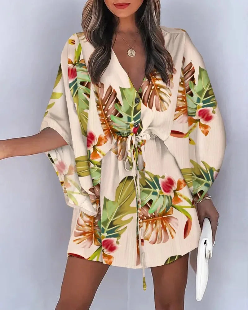 Robe d'été pour femme 2024, imprimé floral, manches chauve-souris mi-longues, col en V, volants, ourlet asymétrique, style bohème décontracté.